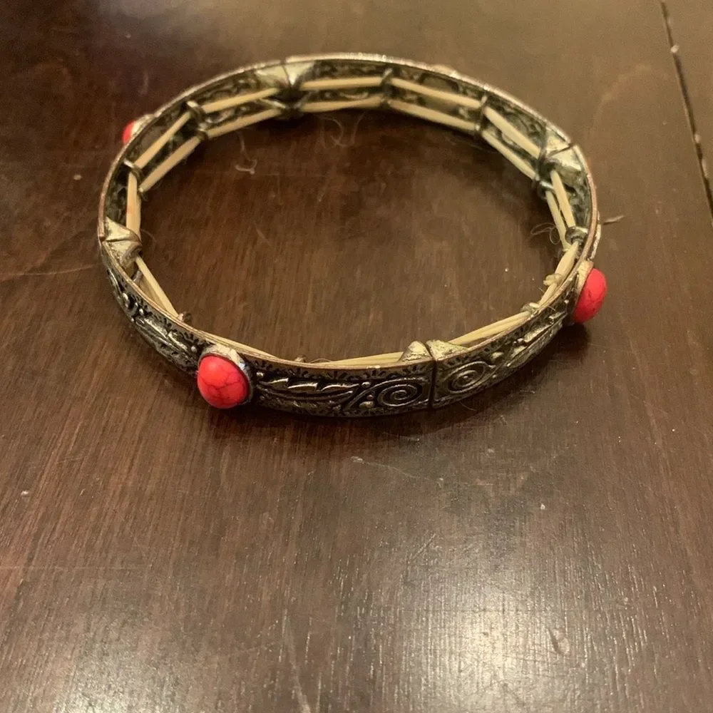 Vintage carved Bracelet with red stones